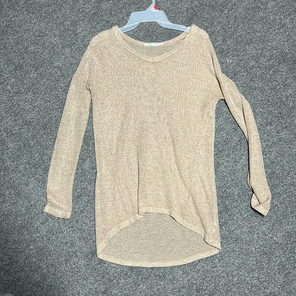 Maurice’s small tan tunic